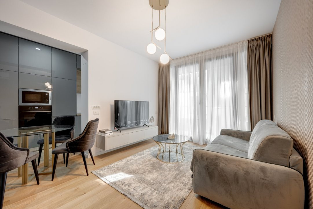 STUDIO DE LUX -WIN HERASTRAU/MOBILAT/UTILAT/LOC DE PARCARE SUBTERAN INCLUS